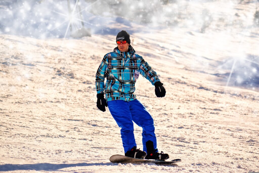 is skiing or snowboarding easier

