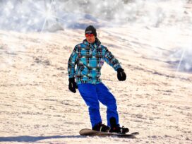 is skiing or snowboarding easier