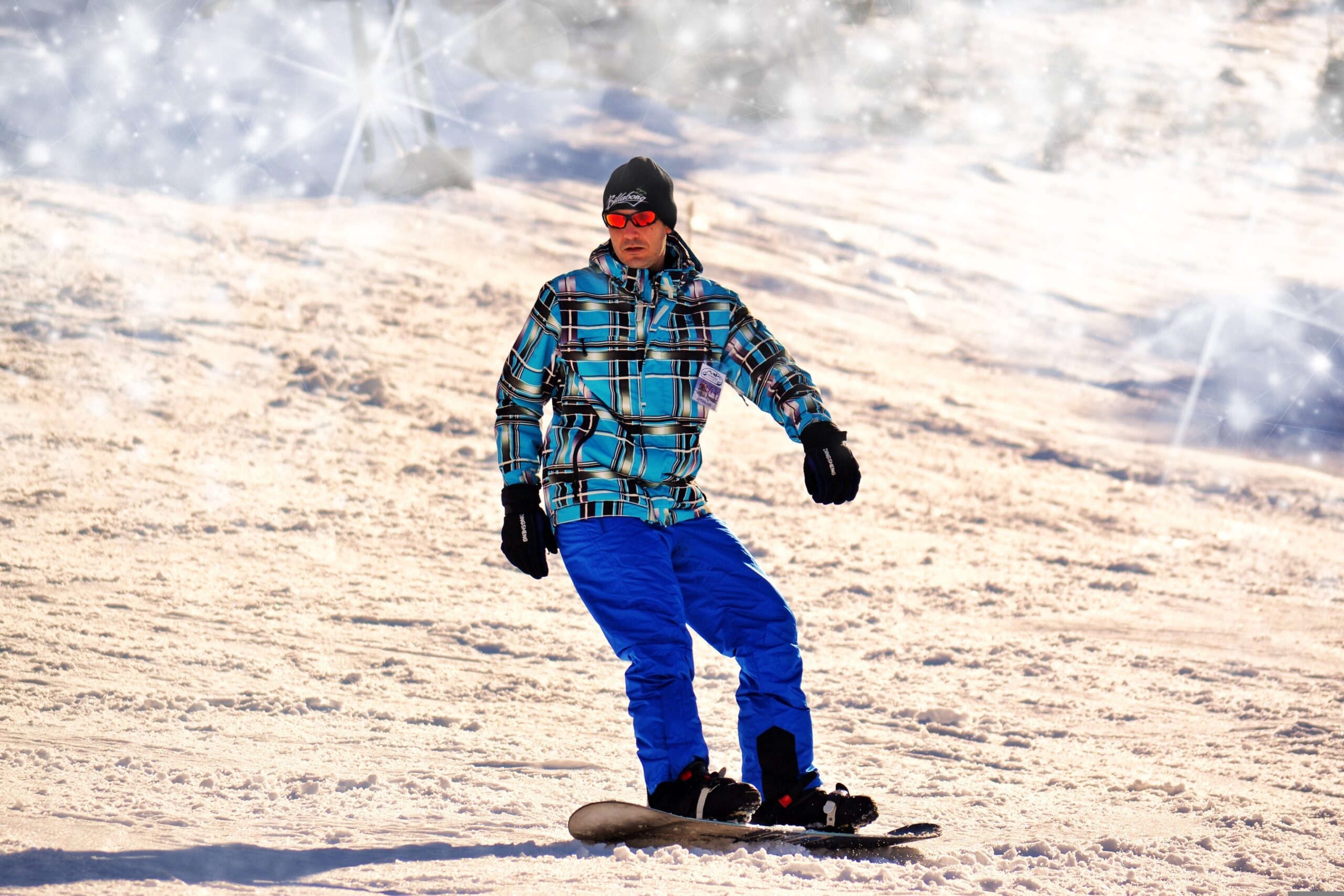 is skiing or snowboarding easier